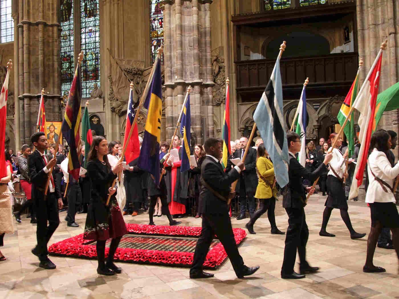 The flags of the Commonwealth nations are processed out of the Abbey at the end of the service