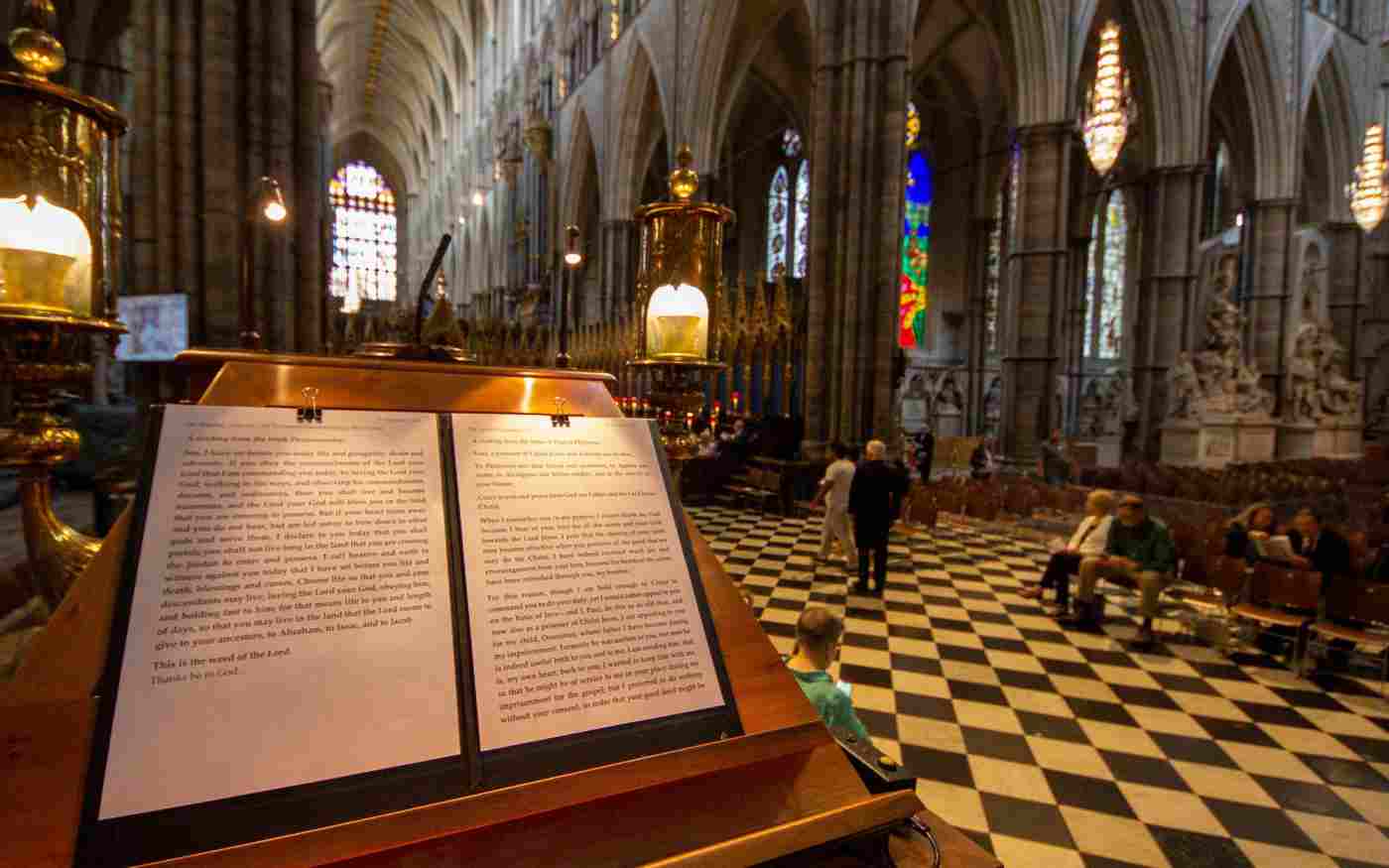 A lectern in the foreground with congregation behind