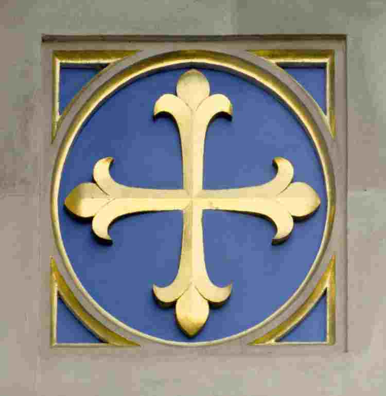 Gold cross on a blue background