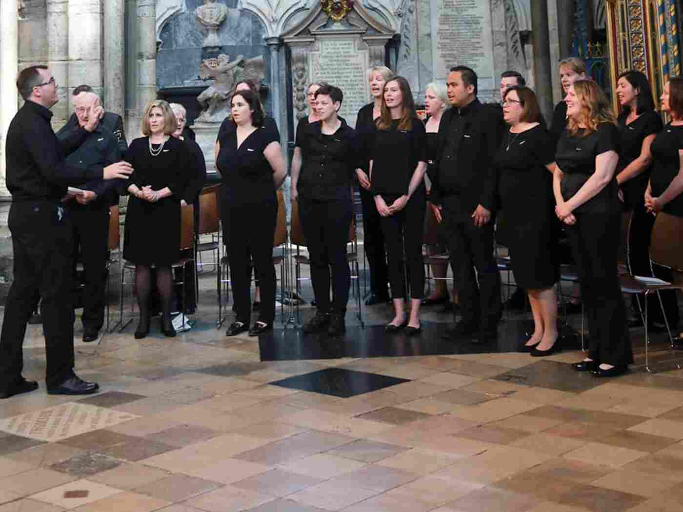 The singing Staff of Chelwest, directed by Jonathan Eyre, perform before the service