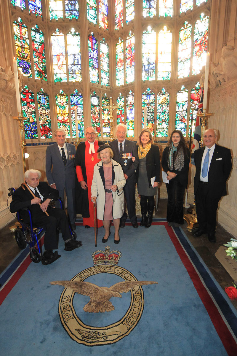 Veterans and families in the Abbey's RAF Chapel with the Dean of Westminster, the Very Reverend Dr John Hall