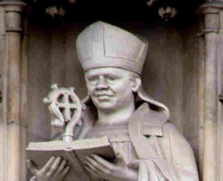 Photograph of Janani Luwum statue, one of 10 modern martyrs above the Great West Door at Westminster Abbey