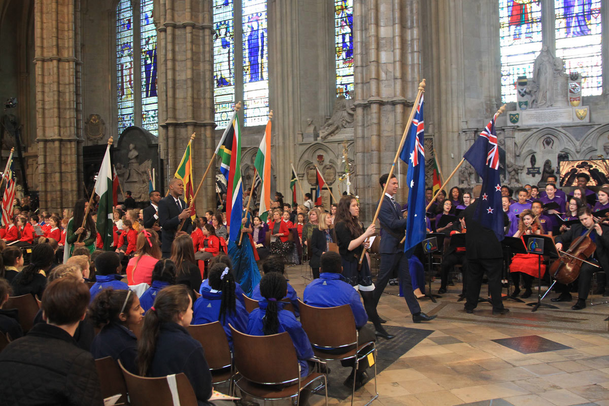 The Flags of the 52 Commonwealth nations are processed through the Abbey
