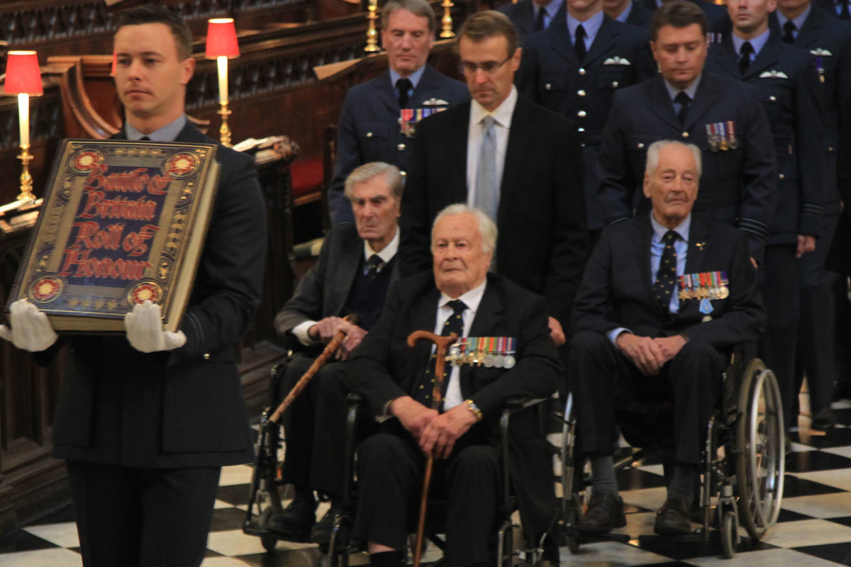 The Battle of Britain Roll of Honour is borne through the Abbey, escorted by The Battle of Britain veterans