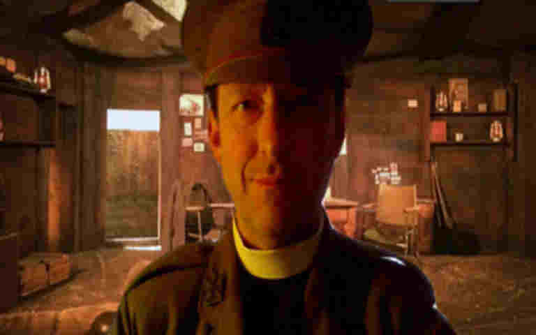 Photograph of member of staff dressed as Padre Railton delivering a Virtual Classroom session
