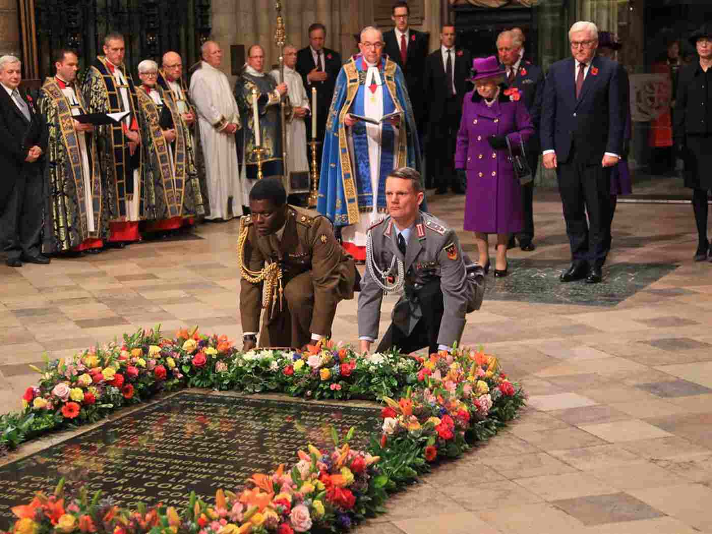 The Queen and the President of Germany place fresh flowers at the Grave of the Unknown Warrior