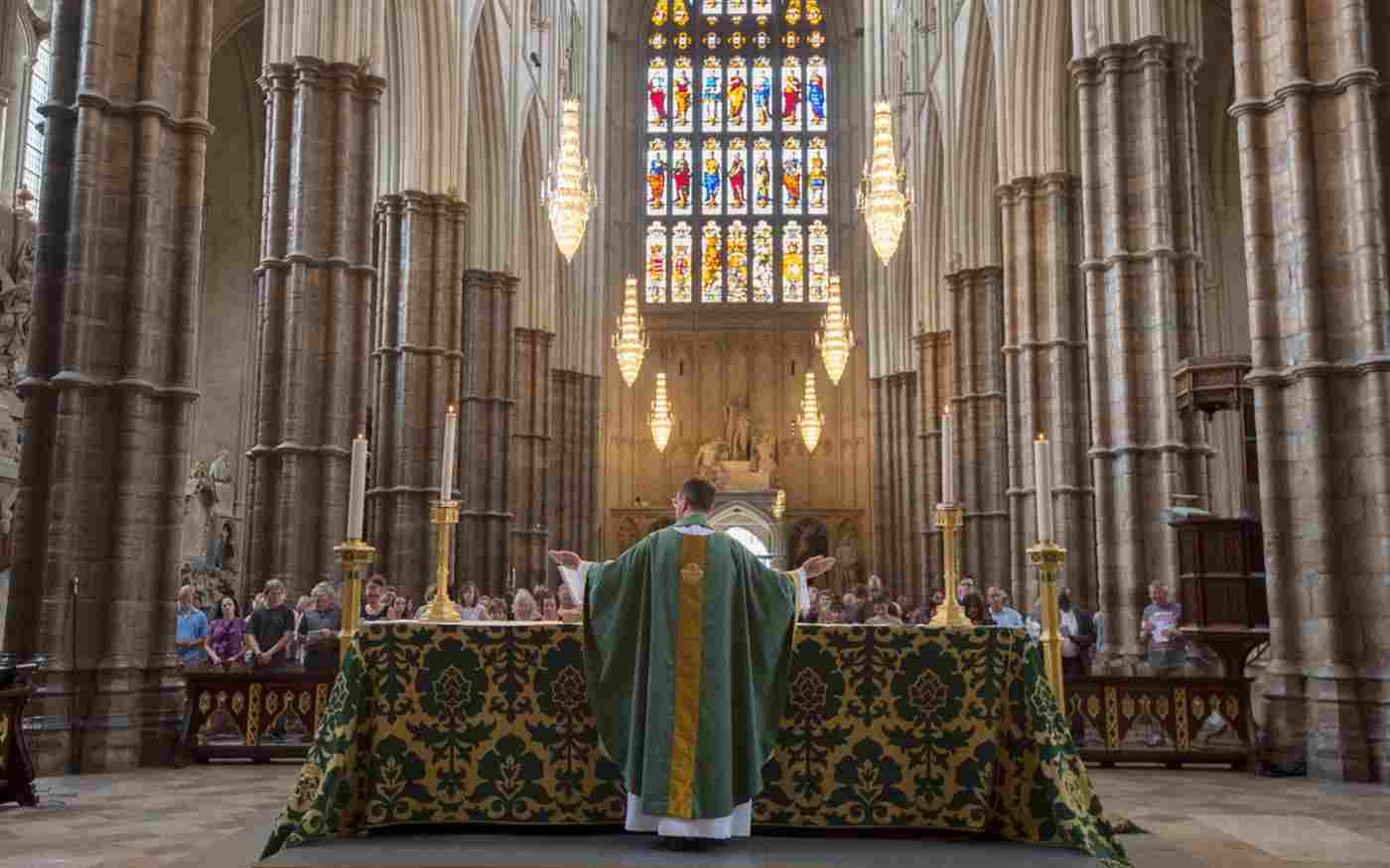 A service as seen from behind the Reverend and altar