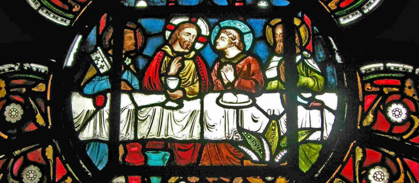 Photograph of the Last Supper within a stained-glass window in Westminster Abbey's Chapter House, representing the theme of Lent and Easter