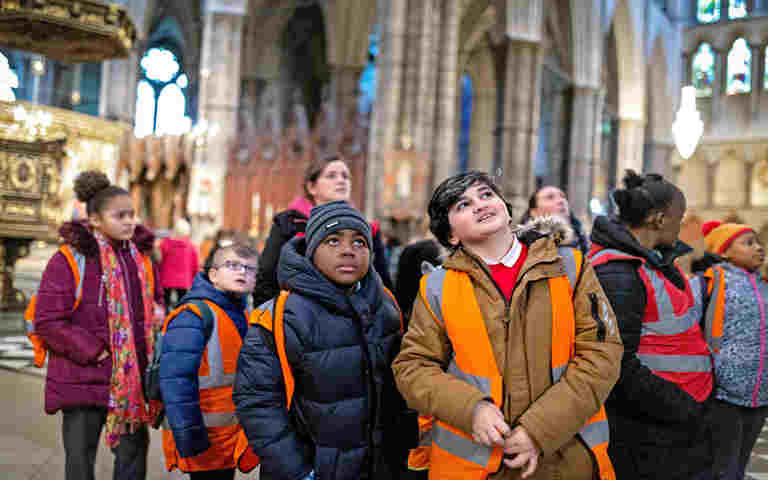 Photograph of a school group visiting Westminster Abbey