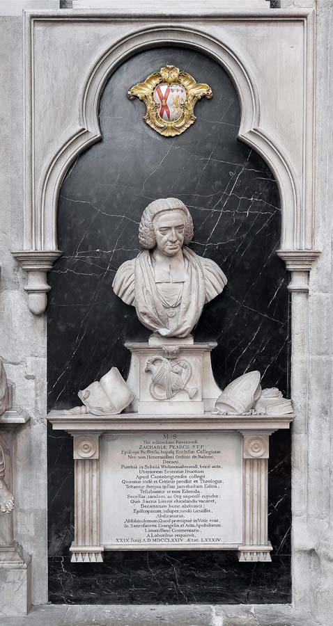 White marble bust of Zachary Pearce with his coat of arms above and an inscription below