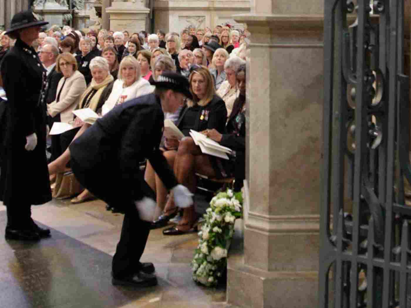 A wreath is placed at the base of the statue to Sir Robert Peel
