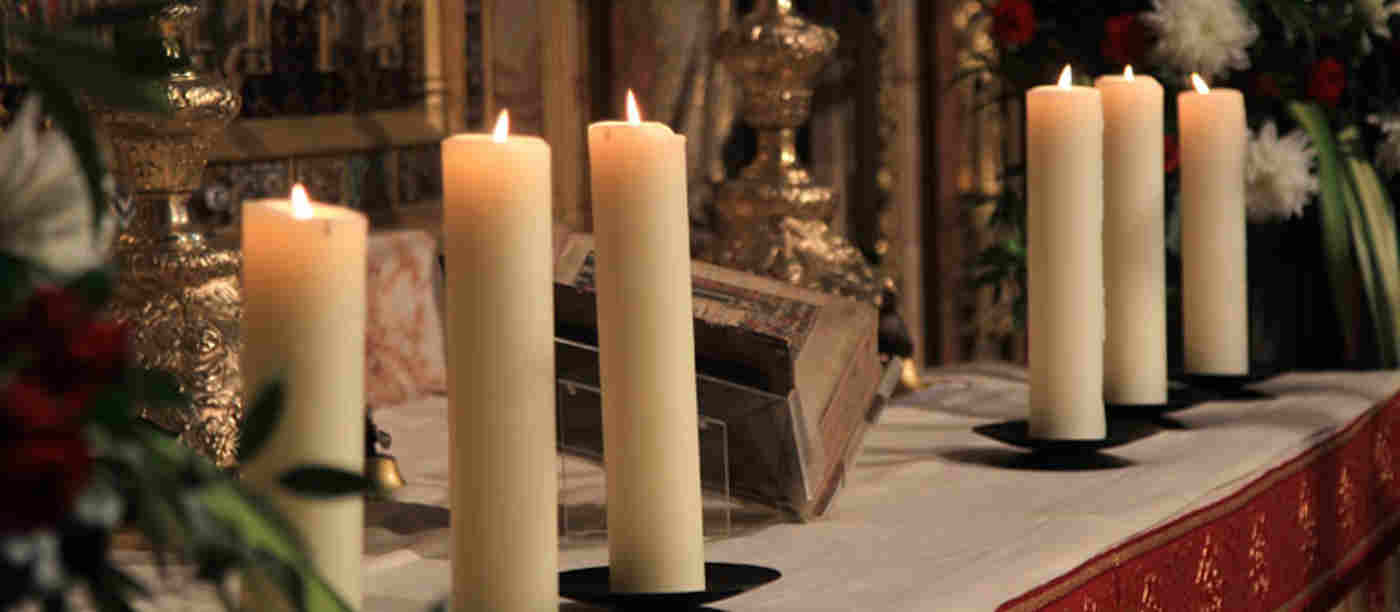 Photograph of candles on an altar in Westminster Abbey, representing faith