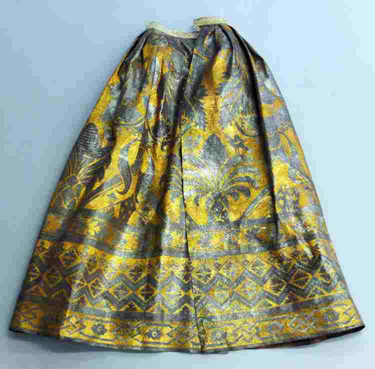 Yellow and silver patterned leather petticoat from the wax effigy of Mary II
