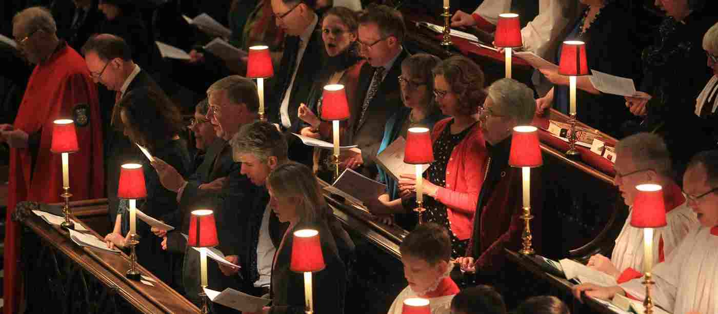 People singing in the quire stalls
