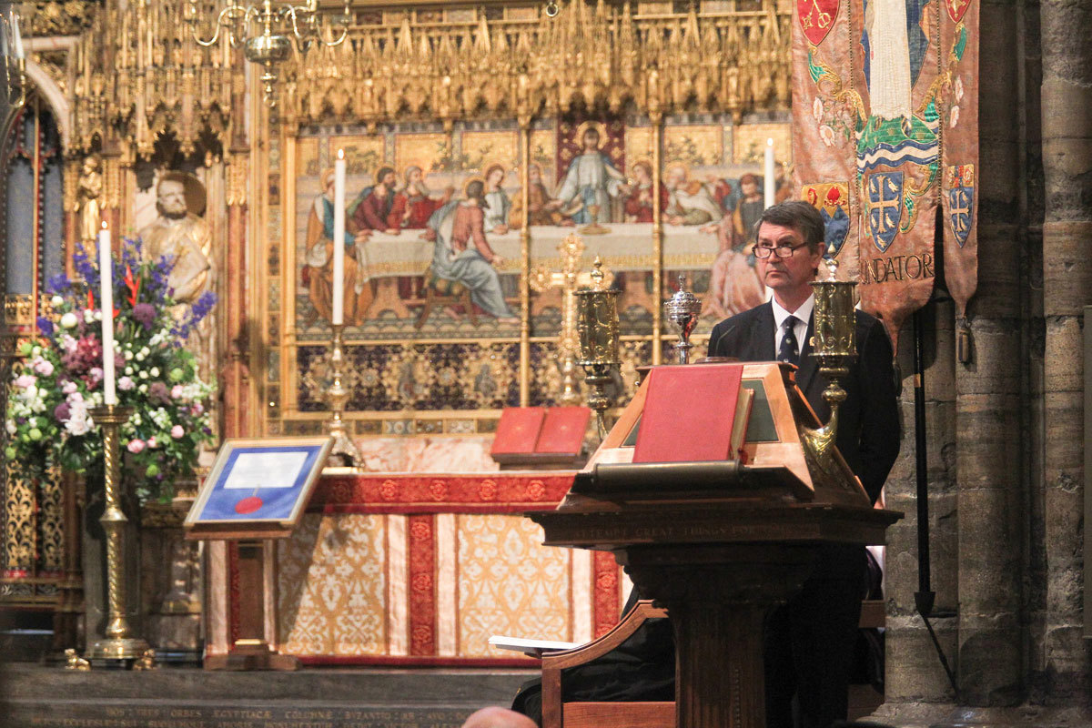 Vice Admiral Sir Tim Laurence KVCO CB ADC, Vice-Chairman, Commonwealth War Graves Commission, reads 2 Corinthians 4: 5-12