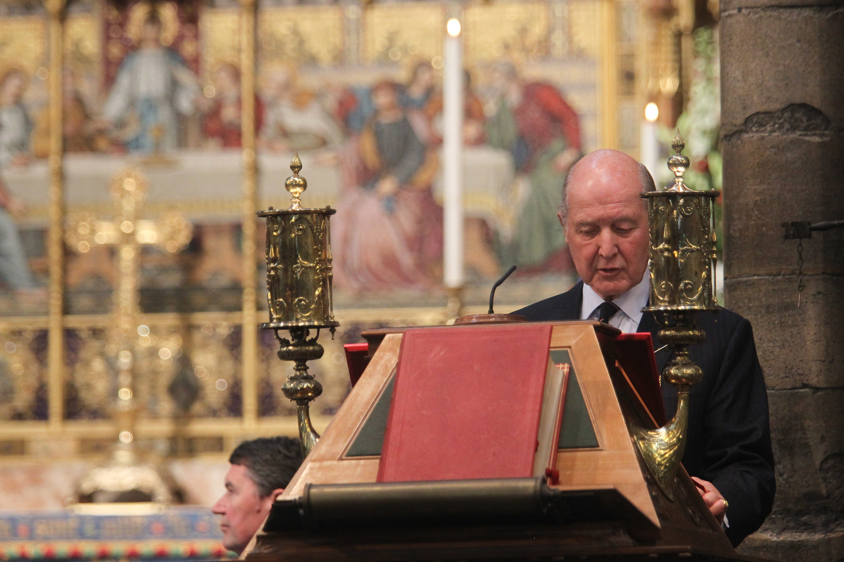 The Right Honourable The Lord Sterling of Plaistow GVCO CBE reads Joshua 1: 1, 4-9 from the Great Lectern