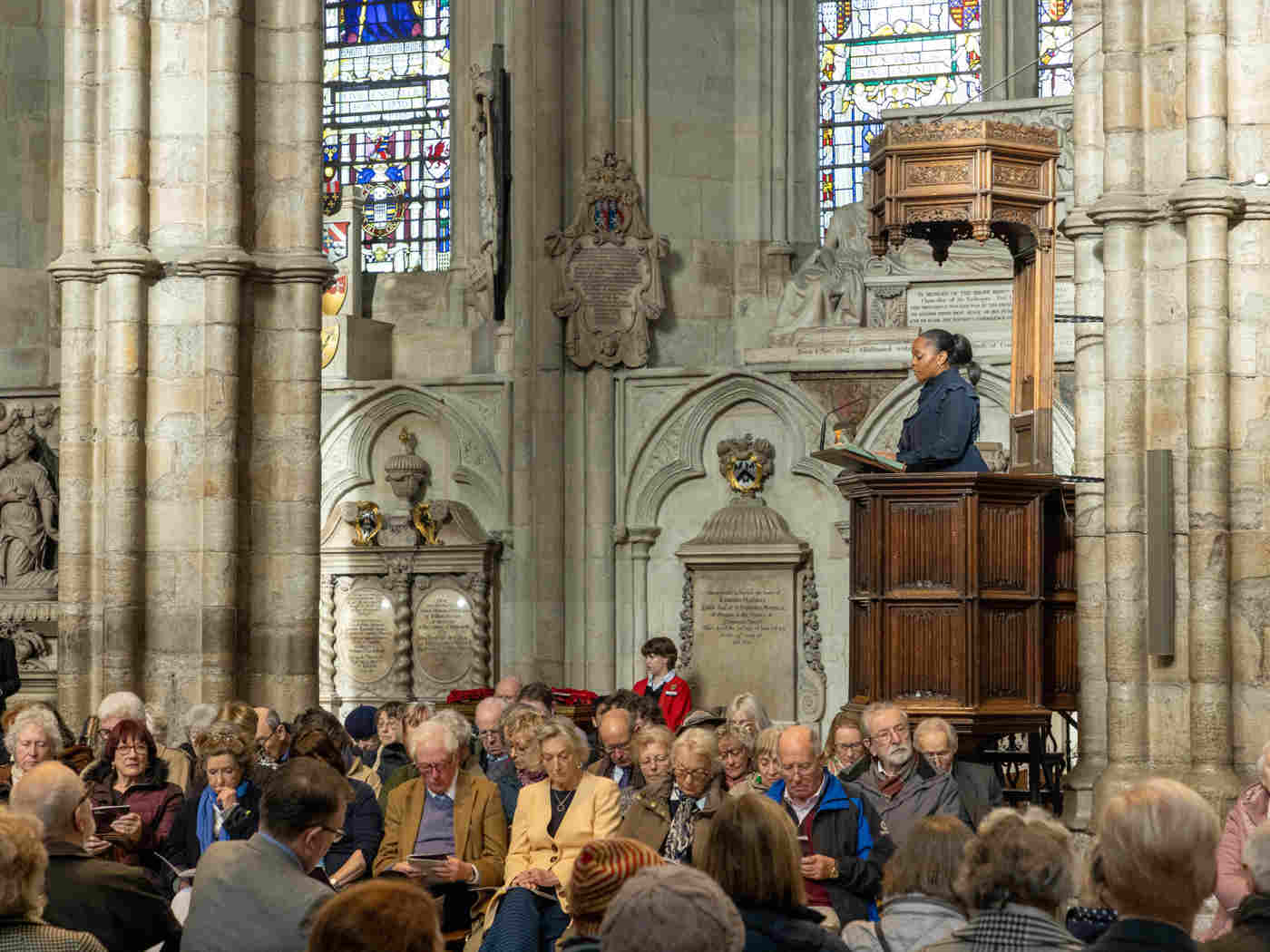 Charisse Beaumont, CEO of Black Lives in Music, reads from the nave pulpit