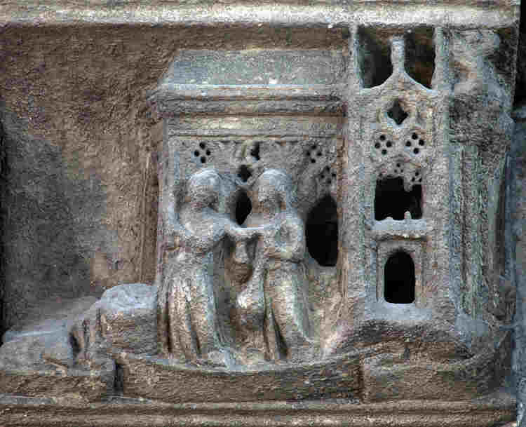Photograph of one scene from the chapel screen depicting the life of St Edward the Confessor