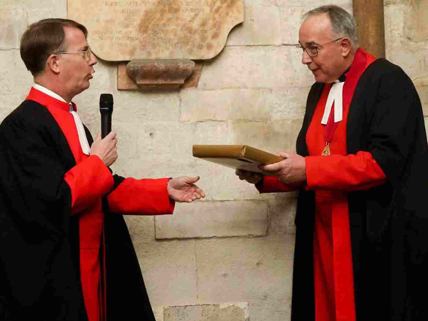 The Receiver General gives the Dean a gift at his farewell reception