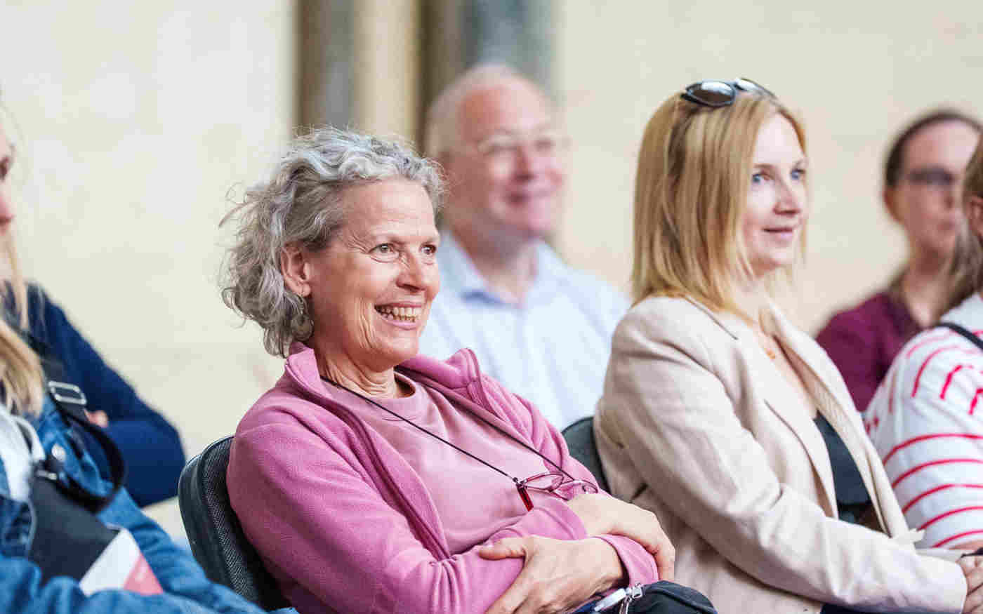 Photograph of seated members of the public listening to a talk within Westminster Abbey
