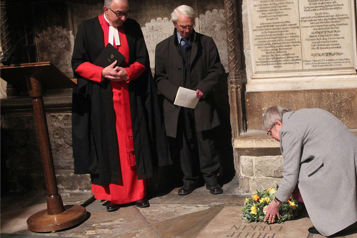 Rosemary Parry, Philip Larkin's niece, lays flowers on the memorial