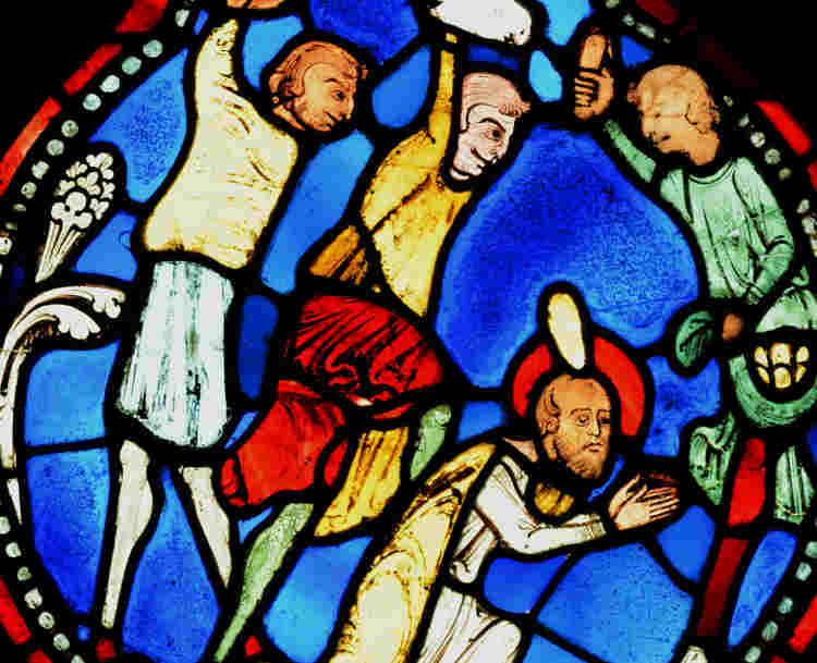 Close-up photograph of a section of stained-glass window showing the stoning of St Stephen within the Queen's Diamond Jubilee Galleries within Westminster Abbey