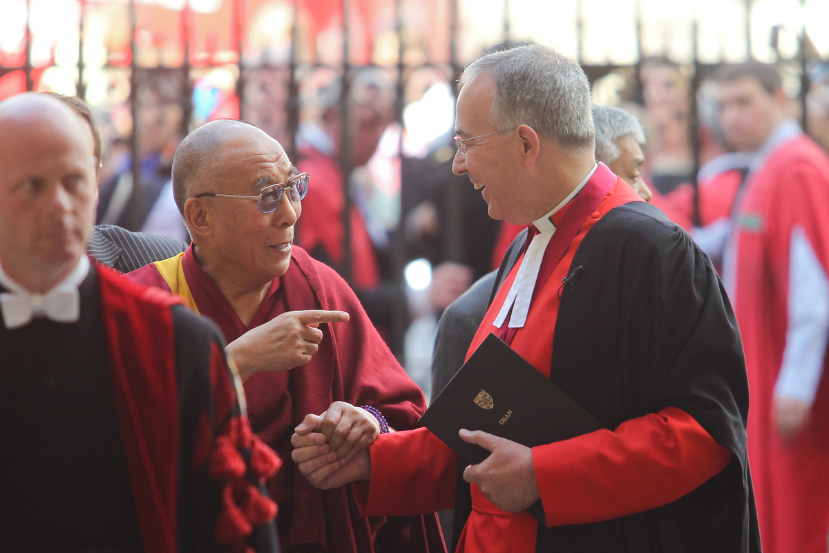 The Dean of Westminster greets the Dalai Lama at the Great West Gate