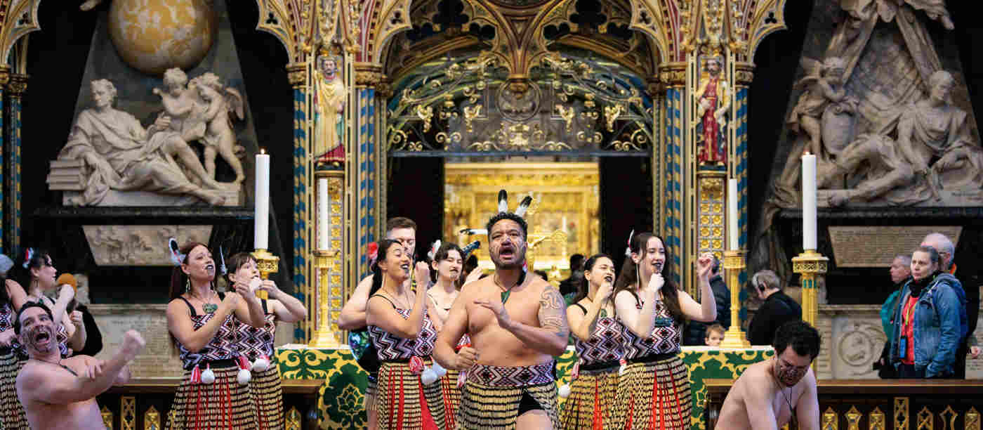 Photograph of a group of Commonwealth performers within the nave of Westminster Abbey