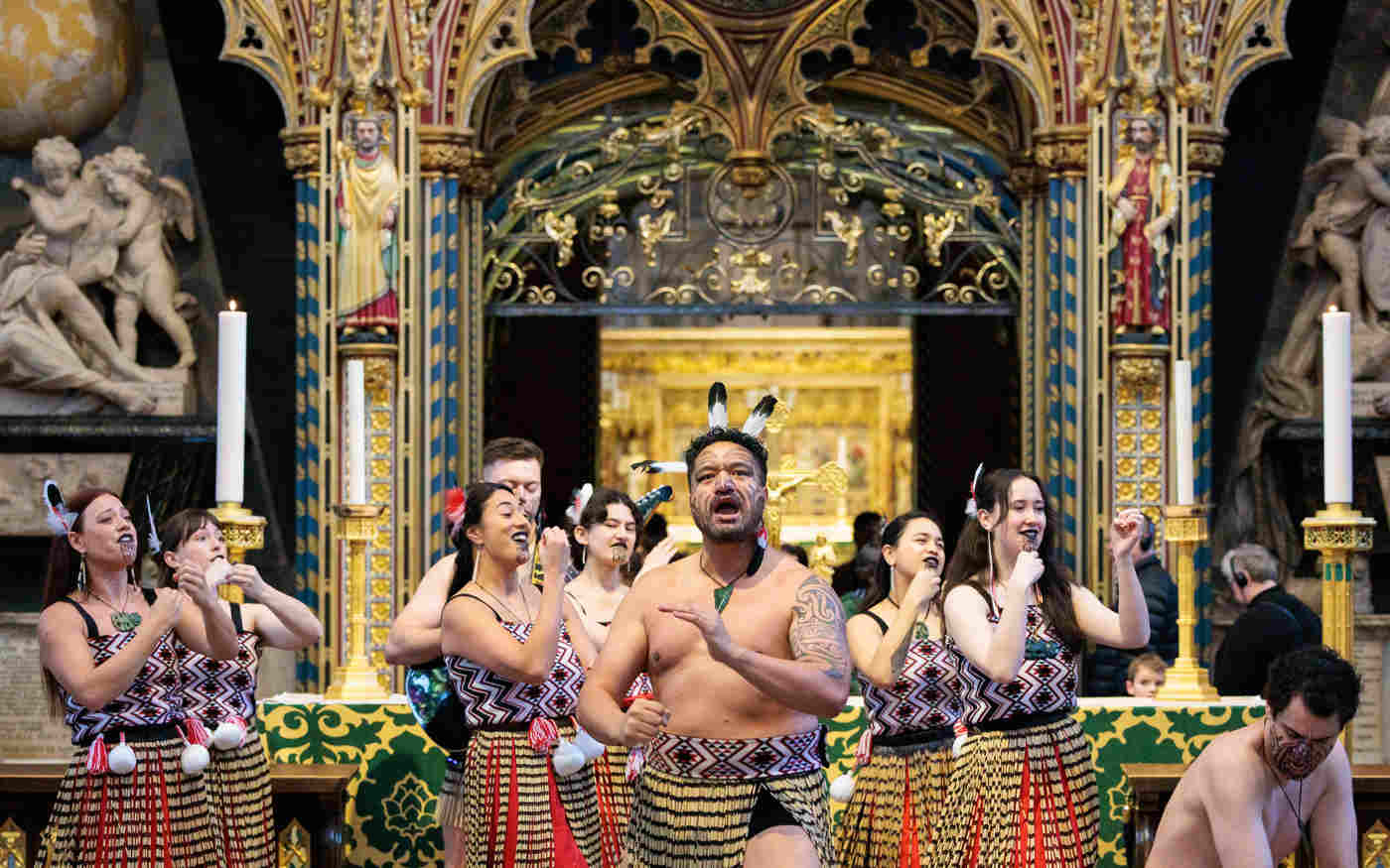 Photograph of a group of Commonwealth performers within the nave of Westminster Abbey