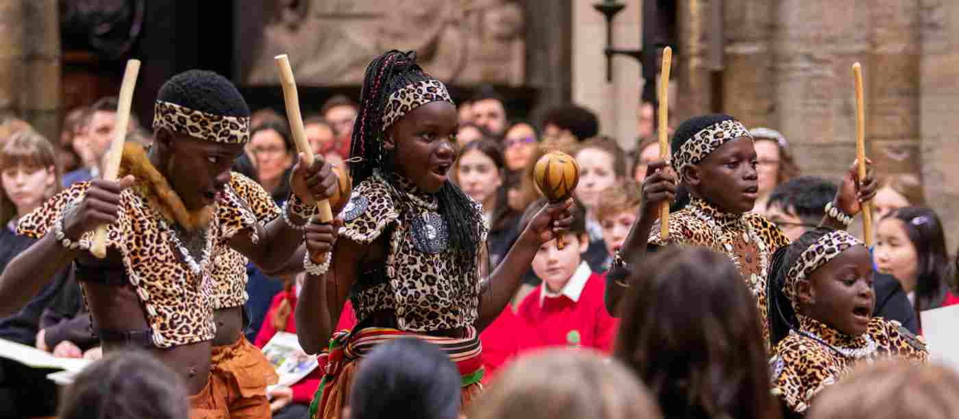 Ghetto kids - A Ugandan dance group - perform as the congregation watch