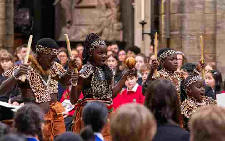 Ghetto kids - A Ugandan dance group - perform as the congregation watch