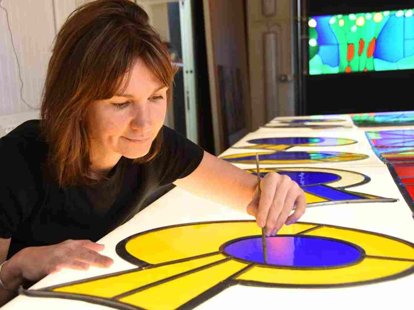 Helen Whittaker works on The Queen's Window at Barley Studio