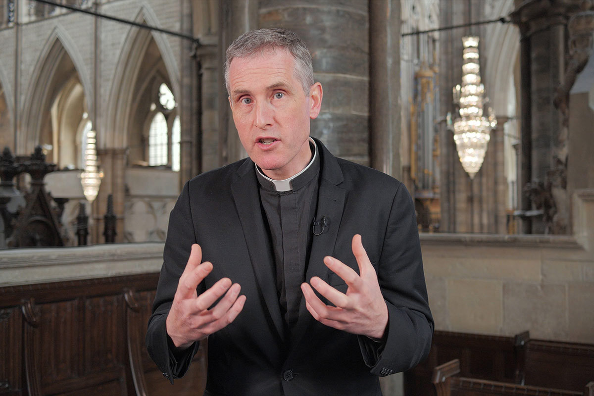 Photograph of The Reverend Mark Birch talking about the Trinity, as part of a series of films titled A Priest's Perspective