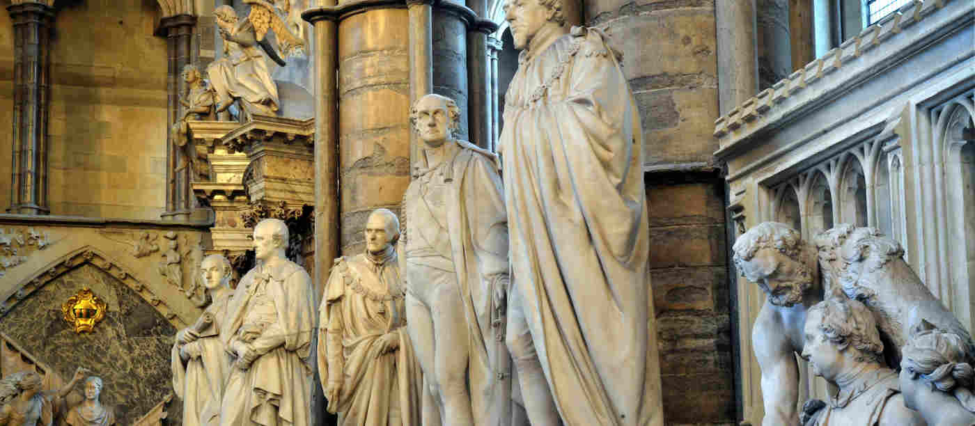 Photograph of statues within Statesmen's Aisle of Westminster Abbey