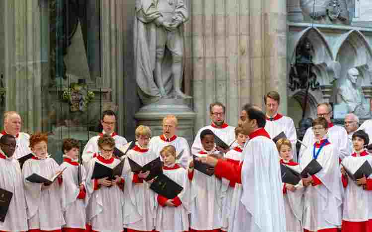 Andrew Nethisngha conducting the choir