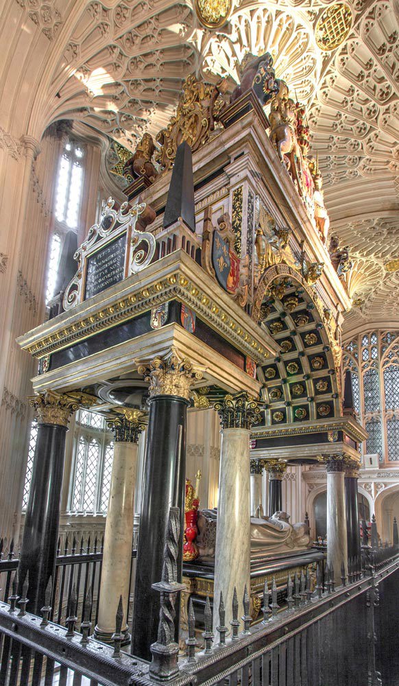 Marble pillars and canopy over Mary Queen of Scots' tomb, which is surrounded by iron railings