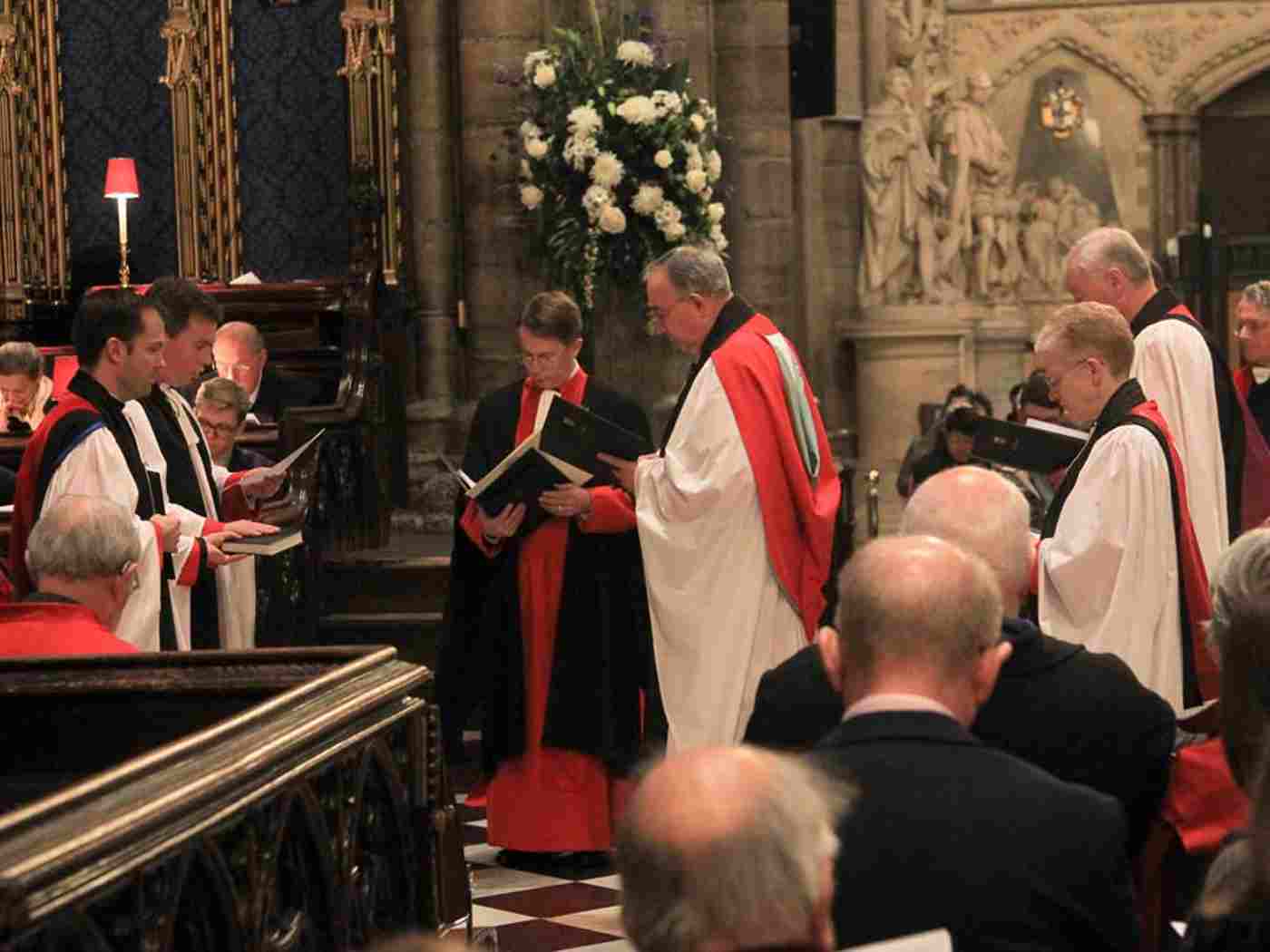 Canon Hawkey reads the Latin Declaration