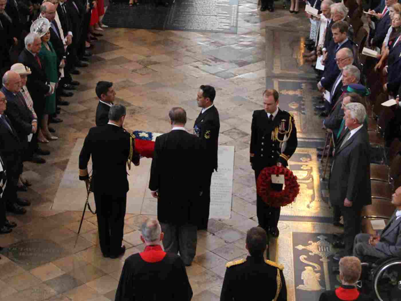 A wreath is laid by representatives of the Ambassador of Chile