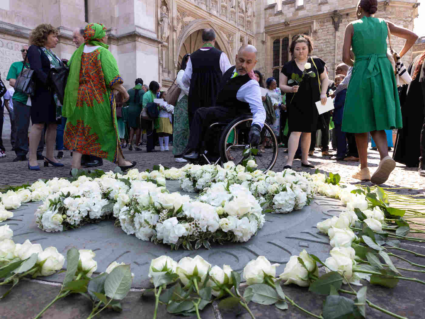 Roses are laid on the Innocent Victims' Memorial