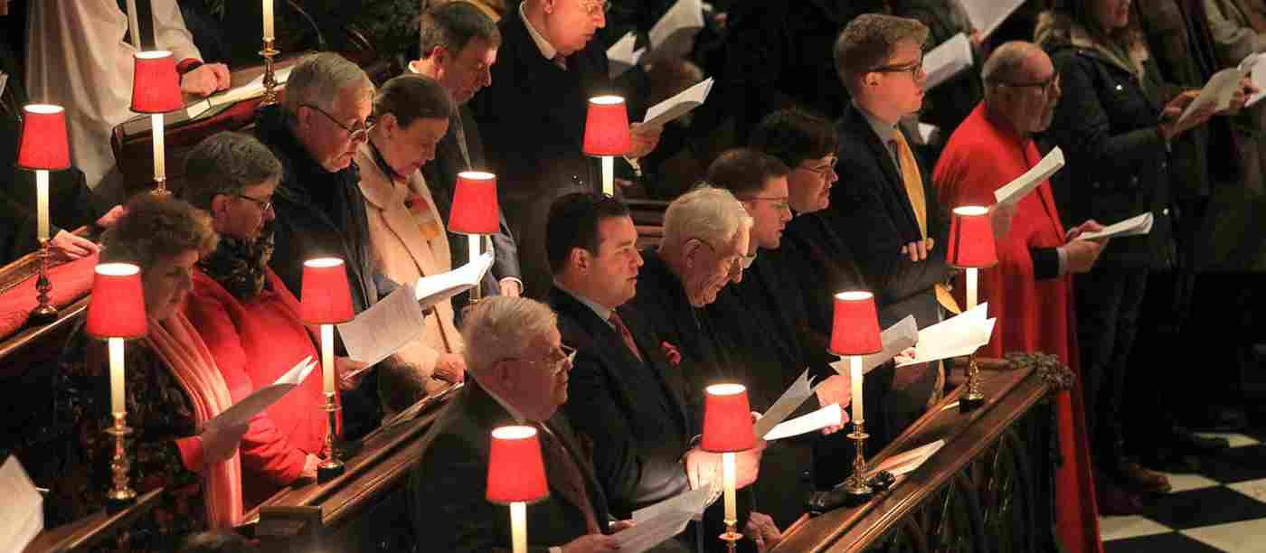 People singing in the quire stalls