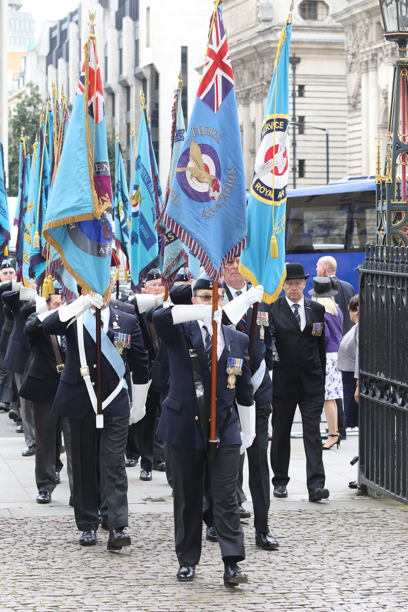 Royal Air Force standard bearers outside the Abbey before the service