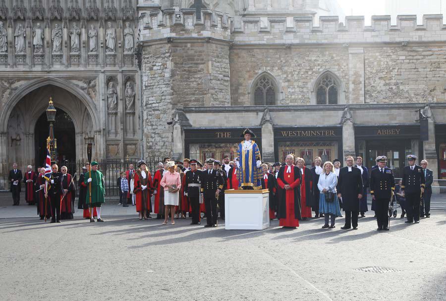 The Mayor of Westminster takes the salute as other officials look on