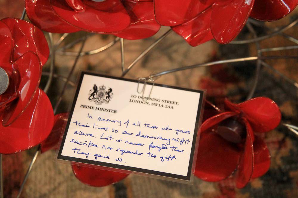 The wreath laid by Theresa May