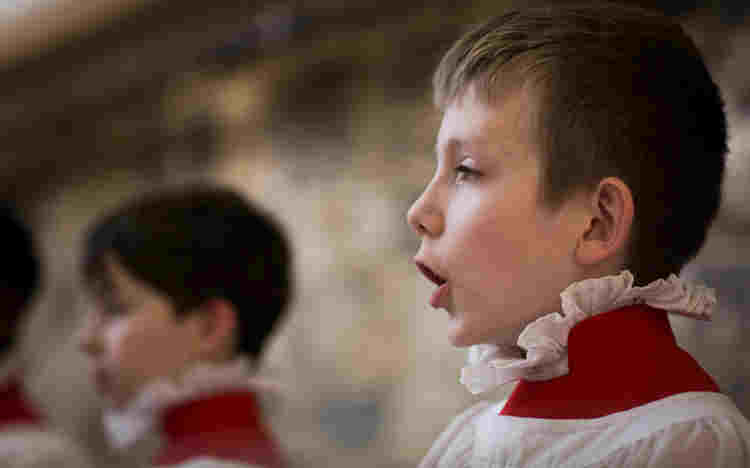 Abbey choristers practicing singing in the Song School