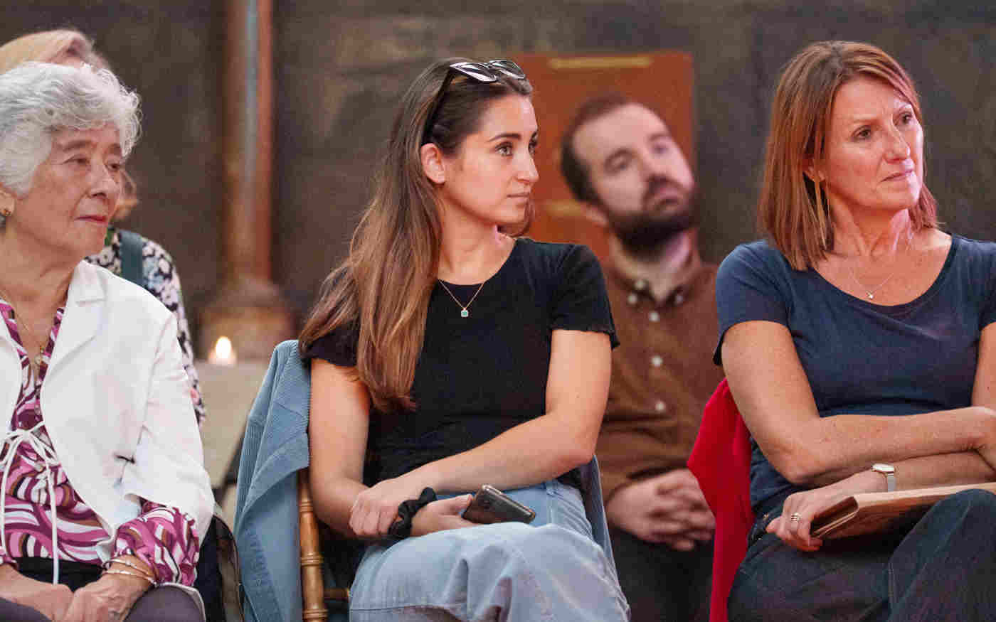 Photograph of seated members of the public listening to a talk within Westminster Abbey