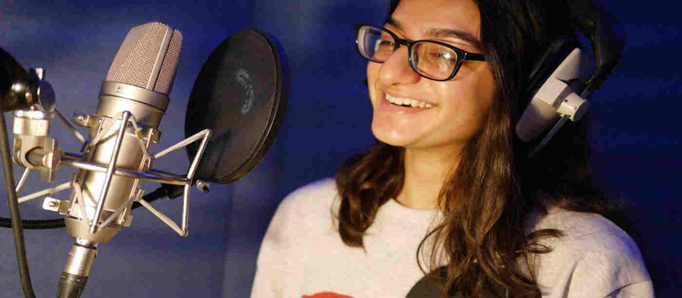 Photograph of a young person taking part in a project at Westminster Abbey
