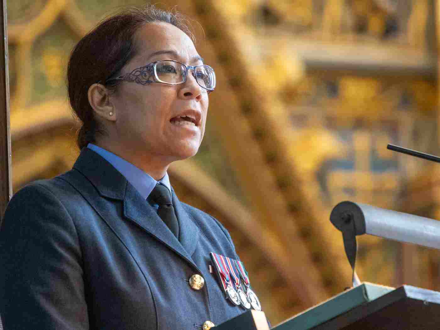 Flight Lieutenant Joanne Mackowski reads from Exodus