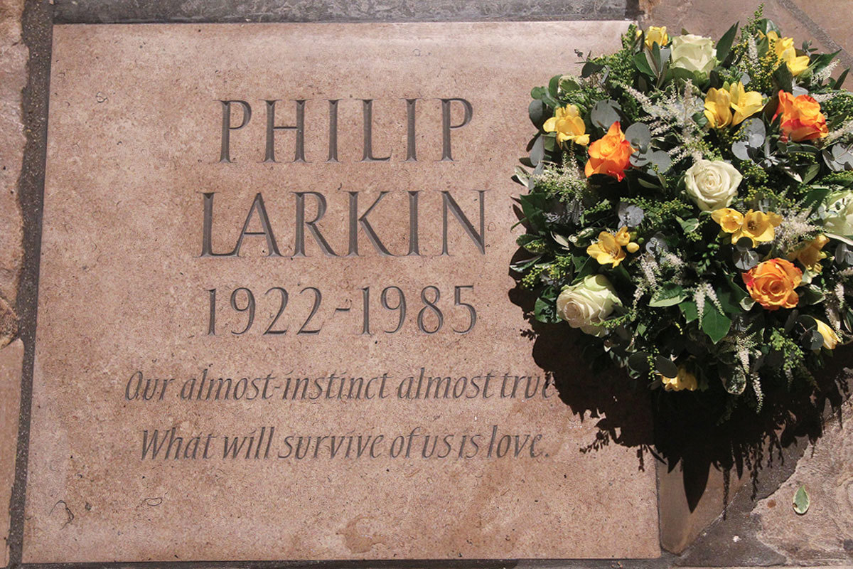 The ledger stone, of Purbeck Downs Vein Marble, was cut by sculptor Martin Jennings, it reads: PHILIP LARKIN 1922 - 1985. Our almost-instinct almost true;/ What will survive of us is love