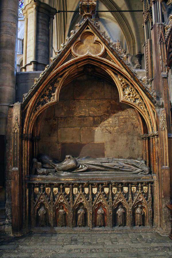 Tomb of Aveline de Forz, her effigy under an arched canopy, small statues below
