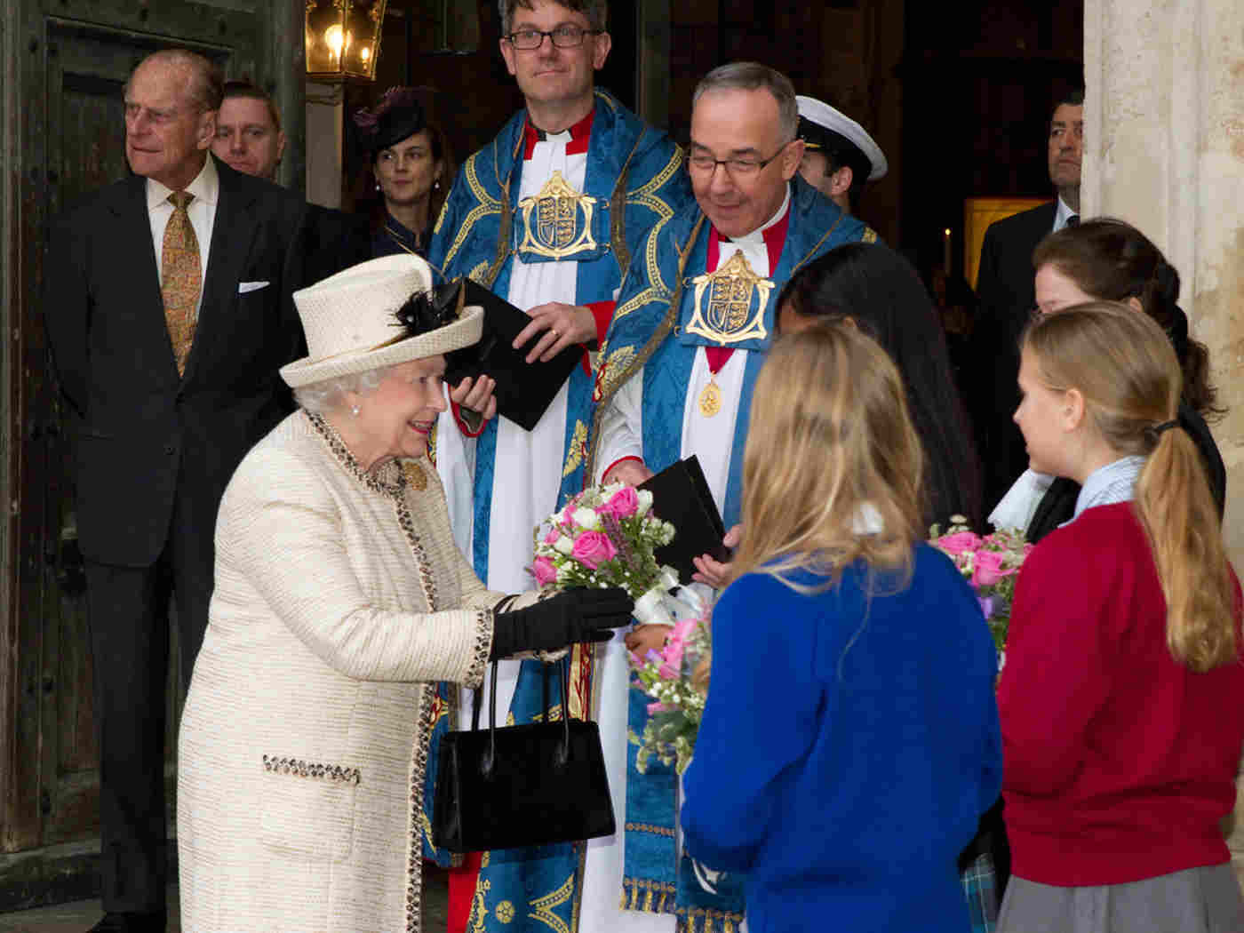 Her Majesty The Queen is presented with a posy